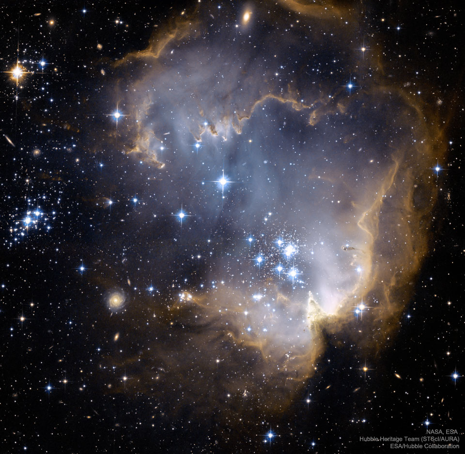A picture from the Hubble Space Telescope showing the star cluster NGC 602. 
Please see the explanation for more detailed information.