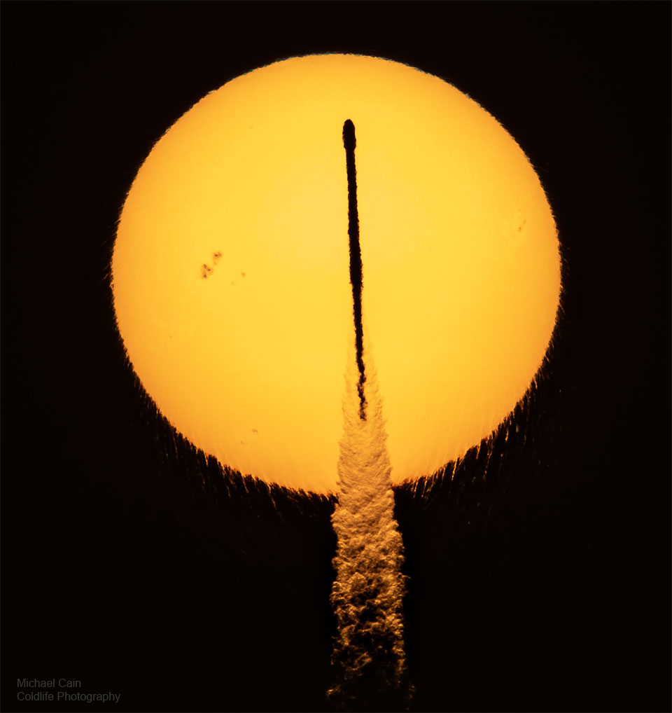 The featured image shows a Falon 9 rocket transiting 
in front of the Sun in mid May. The heat from the rocket's
exhaust makes the Sun's outline appear to ripple.
Please see the explanation for more detailed information.
