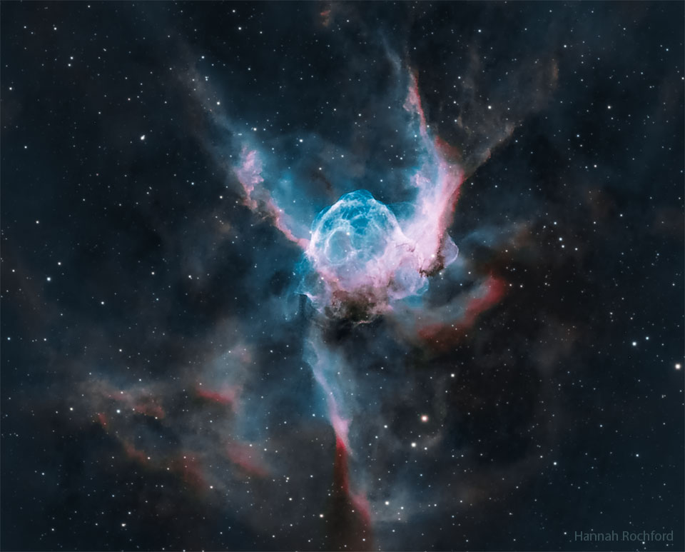 The featured image shows a nebula in blue and red
that looks like a helmet. 
Please see the explanation for more detailed information.